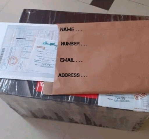 A large sealed package with documents placed on top of it