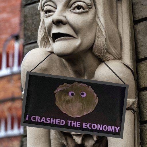 A Liz Truss gargoyle with a sign saying 'I crashed the economy' around its neck