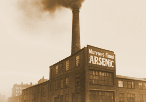 A black and white photograph of a smoke-belching Victorian factory with a sign reading Murray's Finest Arsenic